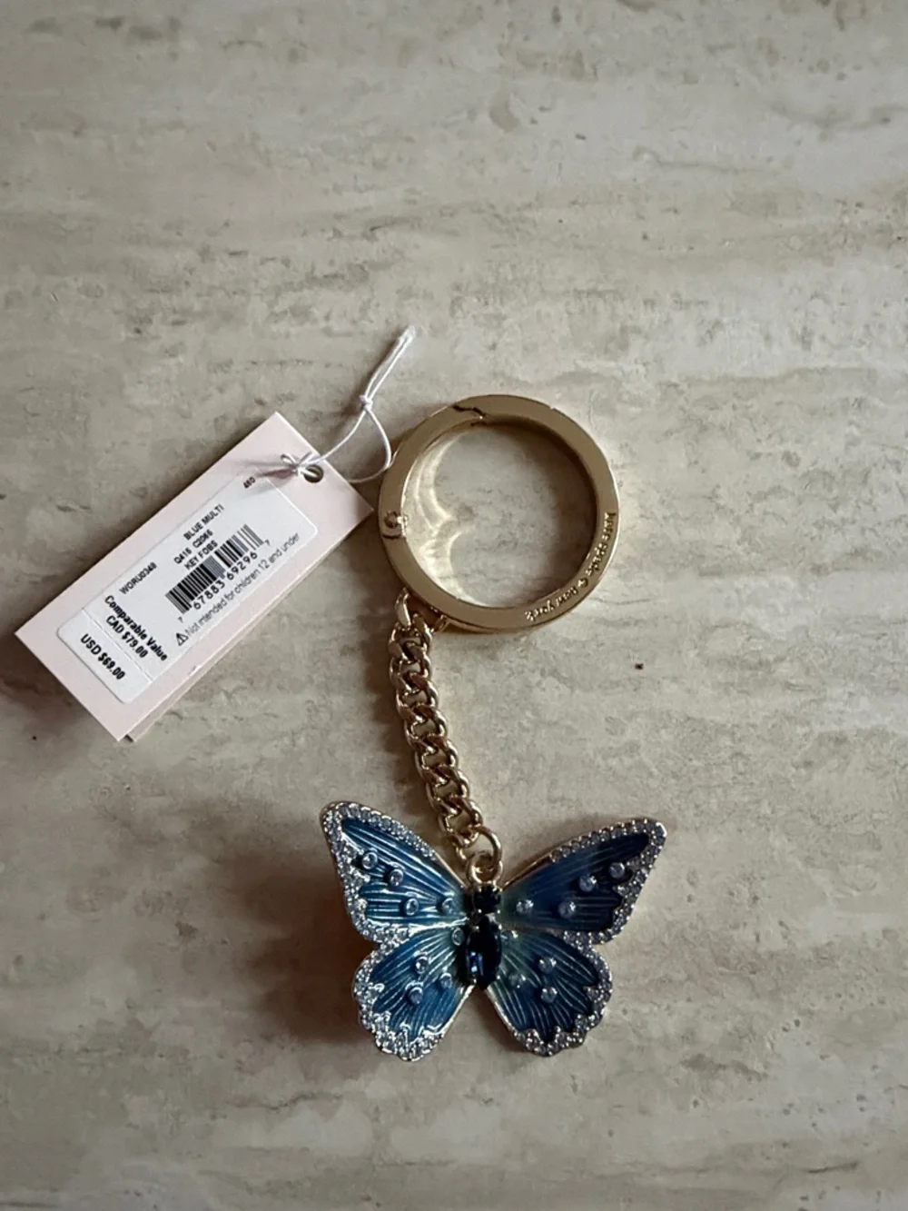 kate spade Gold Keyring with Blue Jeweled Butterfly Charm - Picture 1 of 3
